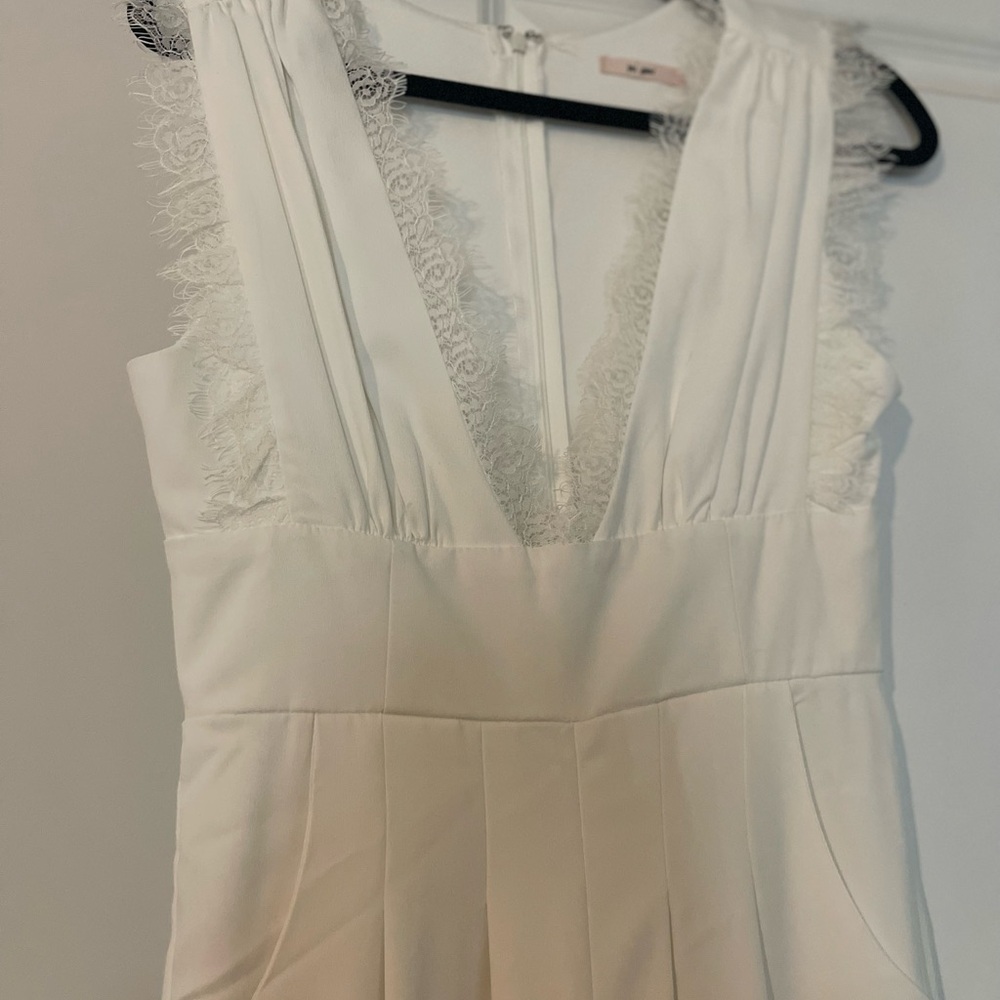 Francesca’s White Lace Trim Jumpsuit